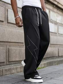 PAVTROS 男士街头风多功能INS单品：宽松休闲闪电水钻印花运动裤，适合街头风、日常休闲、周末出游、音乐节、社交聚会等各种年轻社交场合。这条裤子是男士衣橱中不可或缺的百搭单品，也是送给男友或老公的绝佳礼物。 - 黑色 - 查看 3