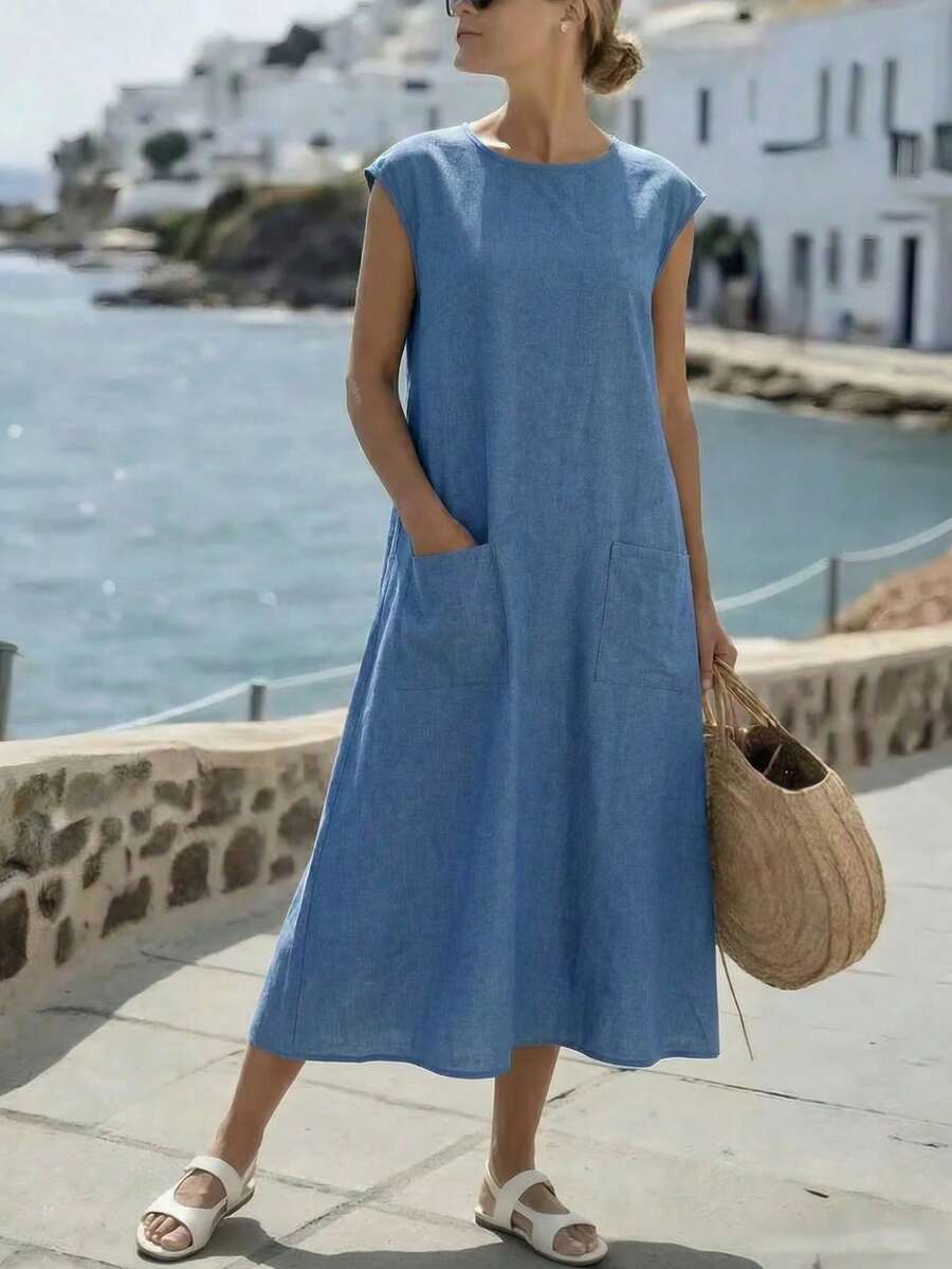 Louniche فستان نسائي أنيق فضفاض بياقة مستديرة وجيب وأكمام قصيرة بلون سادة، مناسب للعطلات والتنقل والارتداء اليومي، فستان فضفاض أنيق للصيف، فستان كاجوال للخارج للاستخدام اليومي في الصيف، فستان صيفي طويل، مناسب لحفلات النساء والمواعيد والملابس الرسمية والأعمال، فستان صيفي للحياة اليومية - الأزرق - مشاهدة 1