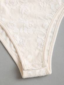 Qadelle Mono con cuello asimétrico, cintura con lazo y pliegues en textura de encaje elegante y romántico para mujeres - Albaricoque - Ver 7