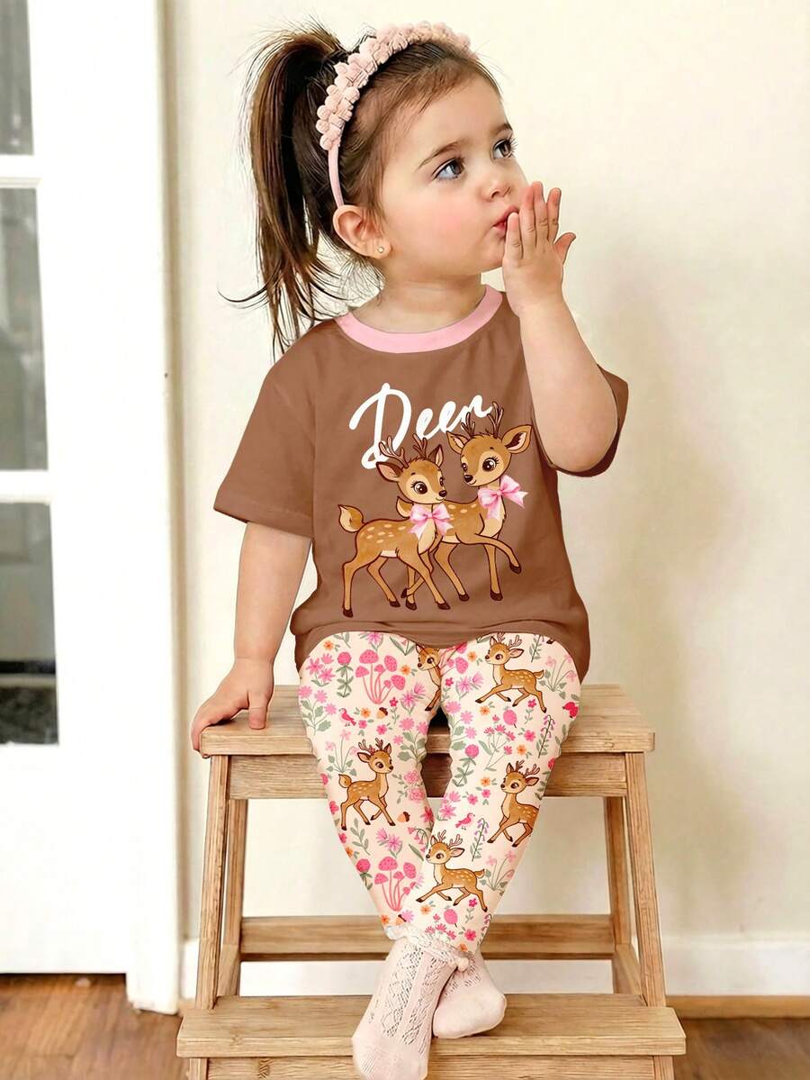 SHEIN 可爱甜美蝴蝶结小鹿“Oh Deer!”波西米亚风印花,女婴休闲简约圆领宽松短袖T恤和裤子两件套,适合春夏日常穿着、街头风、外出、度假、农场、野餐等场合。 - 彩色 - 查看 1