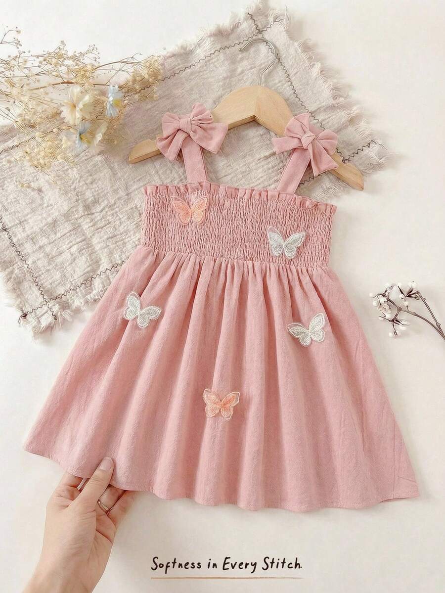 Cozy Pixies Đầm ngắn tay màu hồng cho bé gái, họa tiết bướm 3D, nơ và bèo nhún, kiểu dáng thường ngày, đa năng, thích hợp cho bé sơ sinh và trẻ nhỏ mặc trong ngày, phong cách nghỉ lễ mùa xuân/hè. - Màu Hồng baby - Xem 1