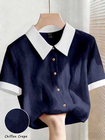 Franclia Áo sơ mi nữ thanh lịch màu hồng nhạt chất liệu chiffon nhăn, cổ trắng, tay ngắn, dáng rộng.