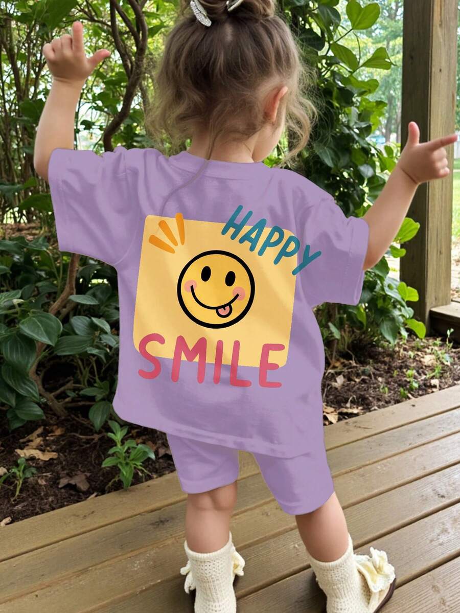 Cream Purple, Cute Hand-Painted Face Pattern, Baby Girl Casual Minimalist Round Neck Short Sleeve T-Shirt And Snug Fit Cycling Shorts 2-Piece Set, Suitable For Daily Wear, Street Photography, Holidays, Spring & Summer - Multicolor - View 1