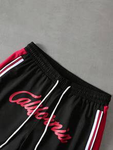 PAVTROS Pantalones cortos de baloncesto con estampado numérico de color contrastante para hombres - Negro - Ver 6