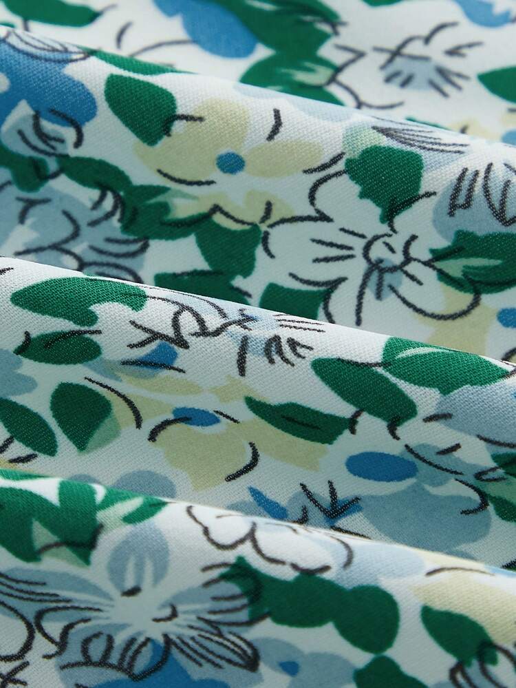 Green Floral Print High Waisted Mini Wrap Skirt With Side Waist Self Tie Bow, Ruffles At Hem Cute Skirt Cottage Skirt Festival Skirt Holiday Skirt Spring Summer French Style Parisian Style Short Outfits For Women Outfit Sets Women Summer Floral Skirt Ruffle Skirt