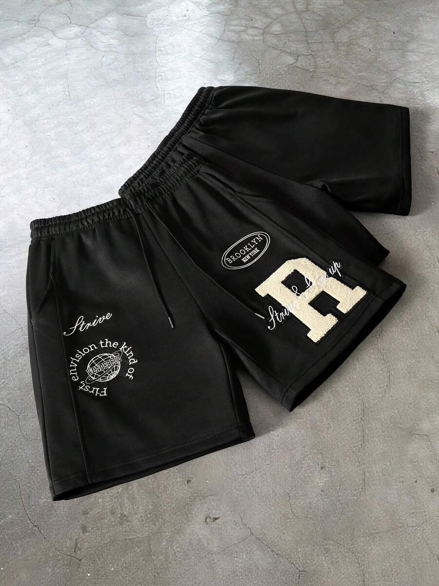 TOKVUE Pantalones cortos sueltos casuales de hombre con bolsillo inclinado y estampado de letras - Negro - Ver 1