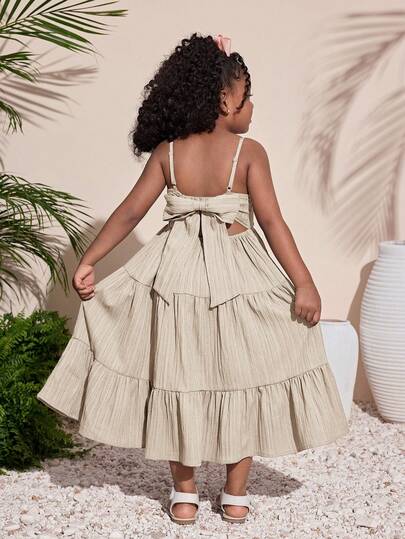 Young Girl's Fashionable & Cute Summer Vacation Textured Bow Decor Loose Strap Dress