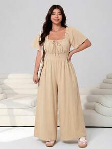 Solflare 2026春夏新款休闲日常穿搭，适合派对、约会、生日、音乐节、返校、通勤、度假等多种场合。荷叶边短袖连体裤，露肩设计，柔软棉混纺面料，宽松版型，长款，黑色，大码可选。 - 卡其色 - 查看 5