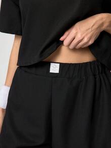 Loungeista 女款休閒純色短袖圓領上衣 & 短版睡褲套裝，高開衩下擺，2件組，春/夏居家休閒套裝 - 黑色 - 查看 10