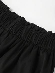 GlowEve CURVE Pantalon asymétrique taille haute pour femmes grandes tailles, avec bouton en résine, taille élastique, poches latérales, jambe large - Noir - Voir 3