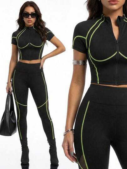 Innovista Bộ đồ thể thao thường ngày dành cho nữ, gồm áo ngắn tay cổ tròn phối màu và quần legging bó sát.