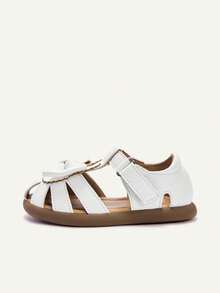 Cozy Pixies Một đôi sandal mùa hè đa năng, phong cách đồng quê, thoải mái, đế mềm mại, khoét rỗng, kiểu dáng giản dị, có nơ hình thỏ dễ thương, màu nâu, đế bằng cho bé gái, thích hợp cho mùa lễ hội. - trắng - Xem 5