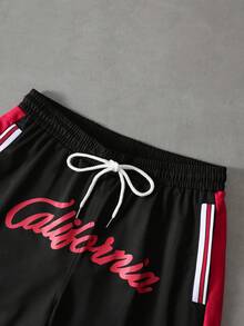 PAVTROS Pantalones cortos de baloncesto con estampado numérico de color contrastante para hombres - Negro - Ver 4