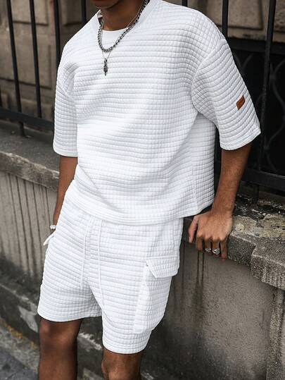PAVTROS Ensemble t-shirt à manches courtes et short décontracté pour homme, avec patch lettrage, col rond et épaules tombantes. Tenue d'été.