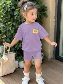Cream Purple, Cute Hand-Painted Face Pattern, Baby Girl Casual Minimalist Round Neck Short Sleeve T-Shirt And Snug Fit Cycling Shorts 2-Piece Set, Suitable For Daily Wear, Street Photography, Holidays, Spring & Summer - Multicolor - View 2