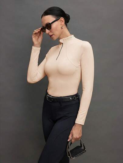 Activina Áo cưỡi ngựa dài tay cổ đứng, màu trơn, ôm sát, cổ kéo khóa nửa thân, dành cho nữ.