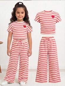 Conjunto informal de vacaciones elegante para niña joven, con top de manga corta acanalado de punto jacquard a rayas y pantalones a juego. Conjunto a rayas, conjunto de dos piezas a rayas, pantalones a rayas, top a rayas, conjunto para niña joven, atuendos de verano para niña joven, conjunto de pantalones para niña joven, traje de manga corta a rayas de primavera y verano - Rosa - Ver 6