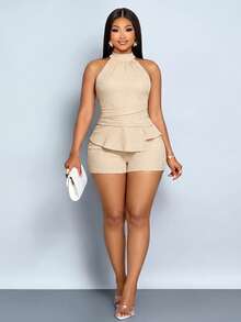 SOLERSUN Bộ jumpsuit dáng suông, gợi cảm, thanh lịch và thoải mái theo phong cách nghỉ dưỡng biển dành cho người có thân hình đầy đặn, với thiết kế ngắn, thời trang, có phần eo thắt và cạp cao, hoàn hảo cho mùa xuân và mùa hè. Mang đến vẻ đẹp tinh tế, sang trọng kiểu cổ điển. - Màu be - Xem 1