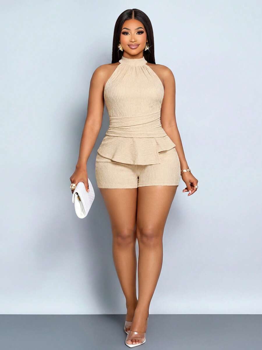 SOLERSUN Bộ jumpsuit dáng suông, gợi cảm, thanh lịch và thoải mái theo phong cách nghỉ dưỡng biển dành cho người có thân hình đầy đặn, với thiết kế ngắn, thời trang, có phần eo thắt và cạp cao, hoàn hảo cho mùa xuân và mùa hè. Mang đến vẻ đẹp tinh tế, sang trọng kiểu cổ điển. - Màu be - Xem 1