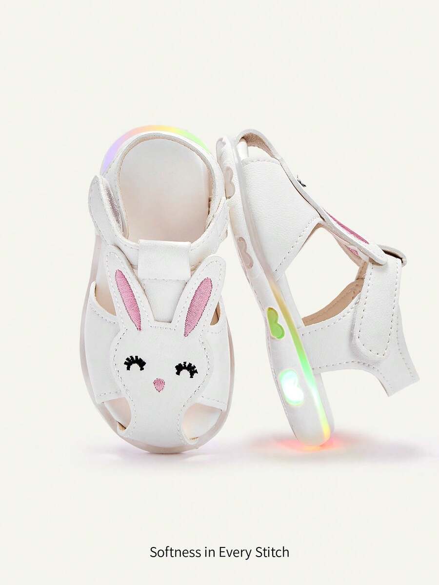 Cozy Pixies Một đôi sandal hình thỏ dễ thương khoét rỗng dành cho bé gái, giày đế mềm cho trẻ sơ sinh và trẻ nhỏ, sandal công chúa thoáng khí mùa hè cho bé, lý tưởng cho kỳ nghỉ hè bên bờ biển, dễ thương, vui nhộn và đa năng. - trắng - Xem 1