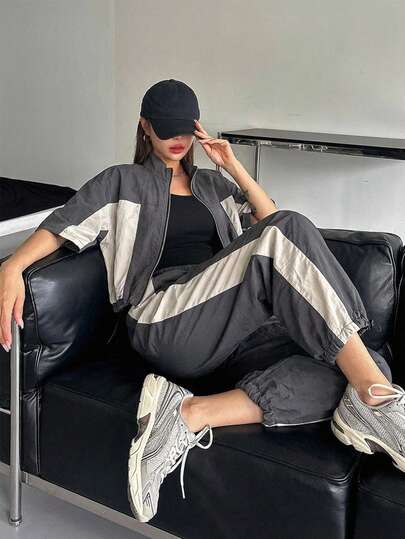 DAZY Bộ đồ nữ 2 món: áo khoác và quần ống rộng có dây rút, phối màu tương phản, khóa kéo, gồm áo khoác và quần túi hông.