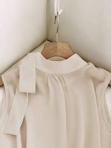 GlowEve Neue Mode für Frühling/Sommer, Trägertop mit Seitenbindung und Knöpfen, ärmellos, französische elegante und vielseitige Bluse für Frauen, Damenblusen und -tops, Damenkleider, Ysk Kleidung, Damenkleidung, Frauenkleidung, Bluse für Frauen, elegante und klassische Damenblusen und -tops, Damenblusen für den Sommer - Aprikosenfarben - Übersicht 3