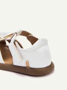 Cozy Pixies Một đôi sandal mùa hè đa năng, phong cách đồng quê, thoải mái, đế mềm mại, khoét rỗng, kiểu dáng giản dị, có nơ hình thỏ dễ thương, màu nâu, đế bằng cho bé gái, thích hợp cho mùa lễ hội. - trắng - Xem 7