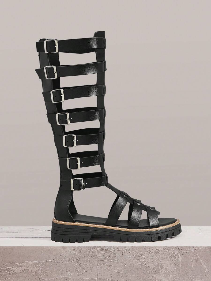 Styleloop Giày Roman mới, giày đinh tán liễu, bốt rỗng thoáng mát, sandal đế bằng cổ trung bình, kiểu dáng thường ngày, gợi cảm, thoáng khí dành cho nữ, thích hợp cho lễ hội mùa hè, bãi biển, kỳ nghỉ, tiệc tùng. - Màu đen - Xem 1