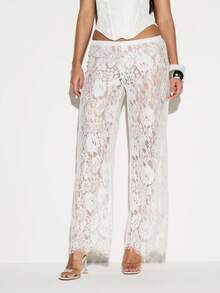 KIZN Women White Lace Wide Leg High Rise Palazzo Pants With Intricate Floral Pattern And Fringe Hem Detail - White - View 1