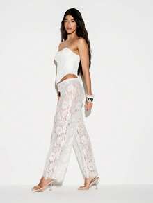 KIZN Women White Lace Wide Leg High Rise Palazzo Pants With Intricate Floral Pattern And Fringe Hem Detail - White - View 4