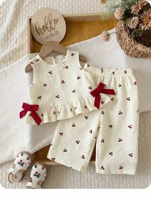 Bộ 2 món cho bé gái, màu hồng trắng kẻ sọc dễ thương, áo không tay thắt nơ và quần short cạp chun. - Màu be - Xem 4