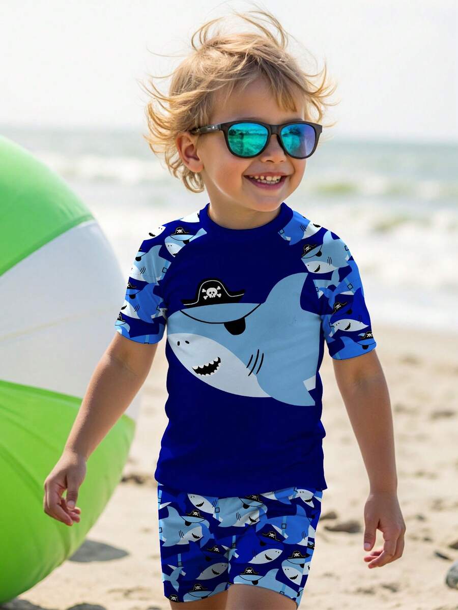 SHEIN Young Boy Casual Loose Round Neck Short Sleeve T-Shirt And Shorts Swimwear Set,Cartoon Pirate Shark Graphic Print For Summer,Beach,Holiday,Swimming - Multicolor - View 1
