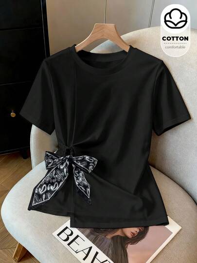 Franclia Camiseta feminina de manga curta com gola redonda e detalhe de laço, casual e versátil para uso diário.