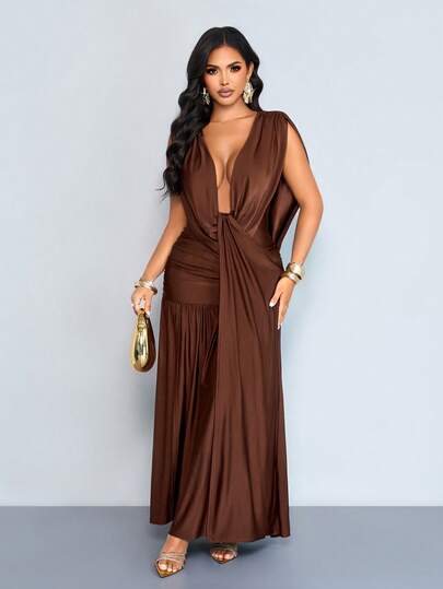 SOLERSUN Spring/Summer Women's Wear: Elegant And Charming, Perfect For Parties And Gatherings. Brown, Glossy Knit Fabric. Sleeveless Deep V-Neck, Halter Neck, Open Back With Tie Details, Gathered Hips, Flowing Ribbon Detail, Front Slit, Maxi Dress.