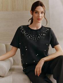2026 Camiseta negra de manga corta con elegante decoración de perlas, adecuada para uso casual diario - Negro - Ver 7
