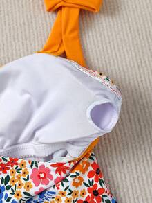 SHEIN Bộ đồ bơi liền thân cho bé gái tuổi teen với nơ và họa tiết hoa, hoàn hảo cho các bữa tiệc bãi biển mùa hè, kỳ nghỉ gia đình và du lịch. - Nhiều màu - Xem 5