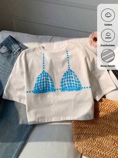 Comfortcana Áo thun nữ dáng rộng in hình bikini, cổ tròn, tay ngắn.