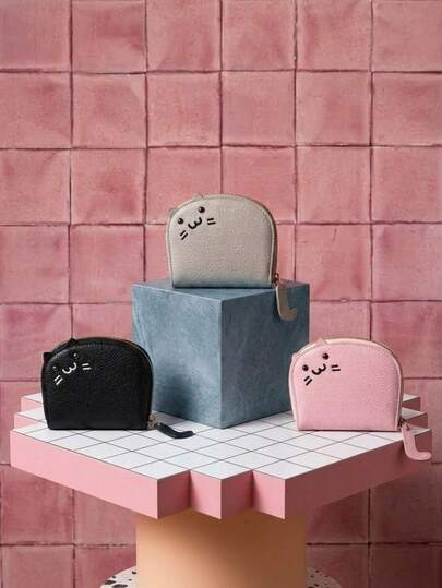 Joivida 猫形真皮小包，尾巴拉链设计，内设卡位和手机位。适合女性使用。是日常出行必备单品，也是情人节、圣诞节或生日等节日送给亲朋好友的理想礼物。春夏皆宜。