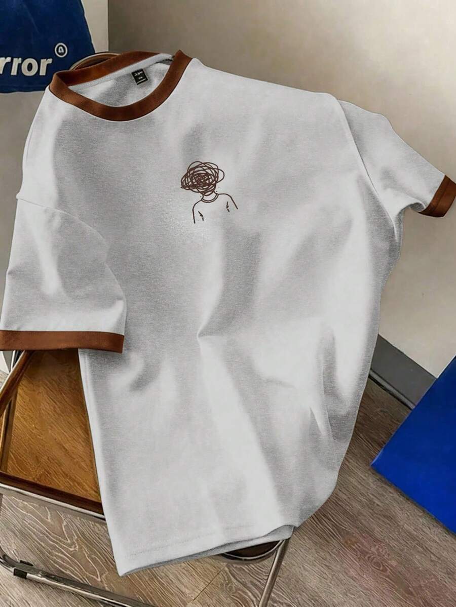 Manfinity Joysei Camiseta de manga corta con gráfico de figura masculina y ribete de contraste - Gris - Ver 1