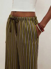 ATUI Studio Women's Green Brown Vertical Striped Loose-Fitting Trousers, With A Relaxed Straight Leg Design, Offering A Casual And Versatile Style. A Must-Have For Spring And Summer, Combining Comfort And Fashion, Perfect For Vacations And Casual Shopping, Offering Exceptional Practicality Wide Leg Striped Pants Wide Pants For Women - Khaki - View 4