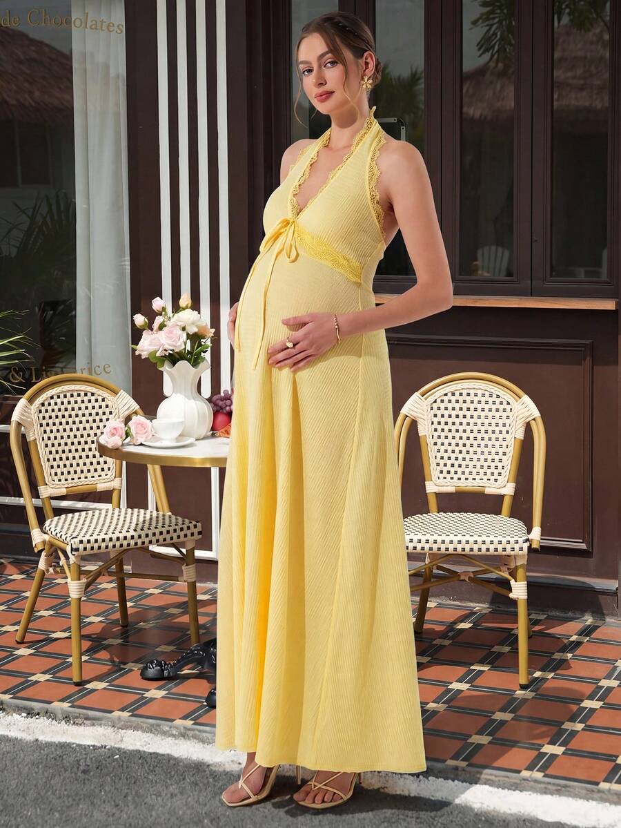 Momance Đầm bầu dệt kim cổ chữ V thắt nơ phía trước, chân váy xòe xếp ly ở eo, chất liệu dệt kim mềm mại, thoáng mát, thích hợp cho các buổi hẹn hò và kỳ nghỉ. - Màu vàng - Xem 1