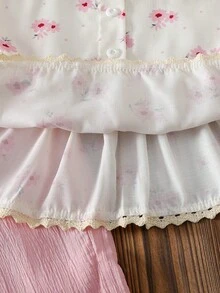 SHEIN 这款适合少女的两件套包括一件白色和粉色相间的吊带背心和一条粉色长裤，打造休闲度假风。吊带背心采用柔软透气的面料，饰以清新的粉色花卉图案，长裤后腰处设有可调节的褶裥，穿着舒适。宽松舒适的提花面料长裤时尚百搭，适合各种场合，包括度假、旅行、郊游、上学和日常穿着。 - 粉色 - 查看 5