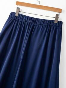 GlowEve CURVE 两件套加大码女士优雅纯色蝴蝶结领无袖上衣和A字长裙套装 - 藏蓝色 - 查看 7