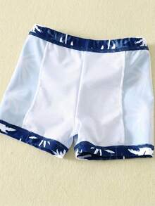 SHEIN Bộ đồ bơi 3 món cho bé trai và bé gái, màu xanh dương, họa tiết cây dừa dễ thương, gồm áo chống nắng dài tay và mũ, thích hợp cho đi biển, bơi lội và nghỉ mát. - Màu xanh hải quân - Xem 8