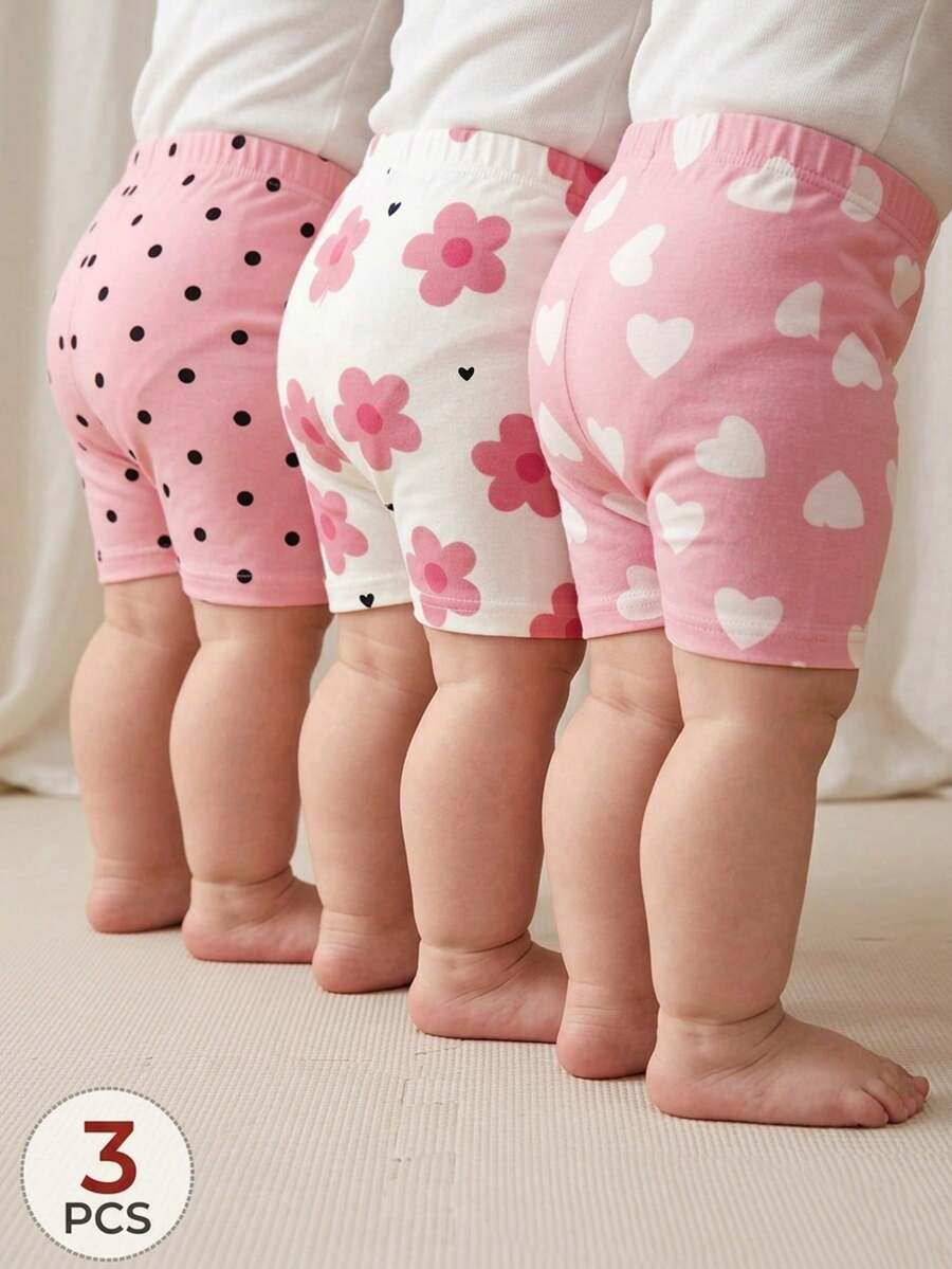 SHEIN Bộ 3 món cho bé gái 6 tháng - 2-3 tuổi, ngọt ngào và tươi tắn / Đa năng với họa tiết trái tim, chấm bi, hoa lá, quần short co giãn ôm sát, phù hợp mặc hàng ngày, đi học, ngày thiếu nhi, mùa xuân/hè/thu. - Nhiều màu - Xem 1