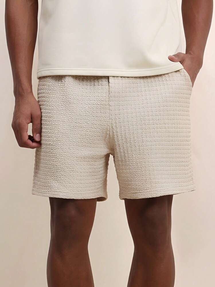Pantalones cortos de hombre con textura de seersucker, con cintura elástica y bolsillos laterales para uso casual en verano