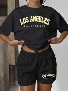 INAWLY Conjunto de camiseta de manga corta con cuello redondo y estampado de letras minimalista, y shorts casuales con cordón en la cintura para mujer - Negro - Ver 3