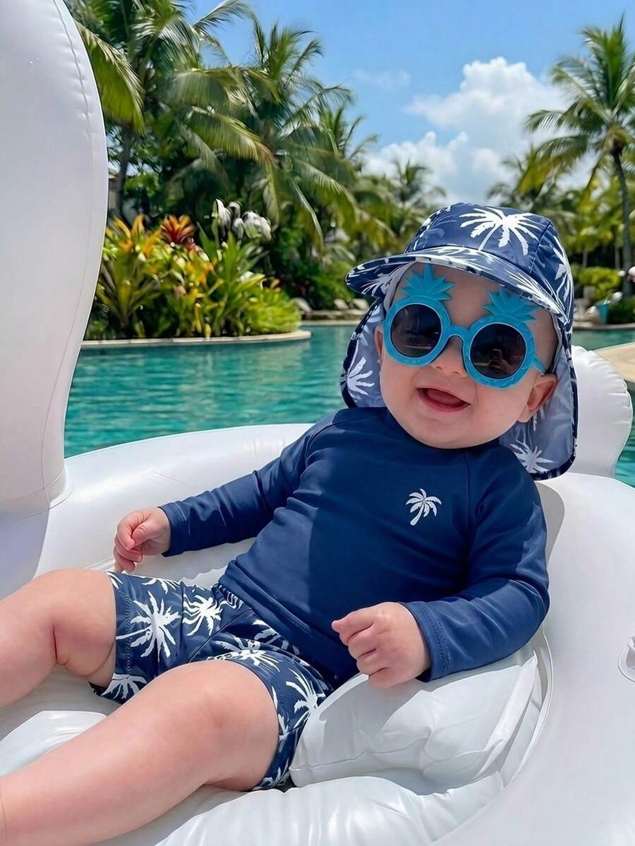 SHEIN Bộ đồ bơi 3 món cho bé trai và bé gái, màu xanh dương, họa tiết cây dừa dễ thương, gồm áo chống nắng dài tay và mũ, thích hợp cho đi biển, bơi lội và nghỉ mát. - Màu xanh hải quân - Xem 1