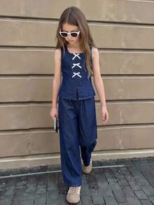 SHEIN Bộ 2 món gồm áo ba lỗ và quần jean dáng rộng màu xanh hải quân dành cho bé gái tuổi teen. - Rửa tối - Xem 5