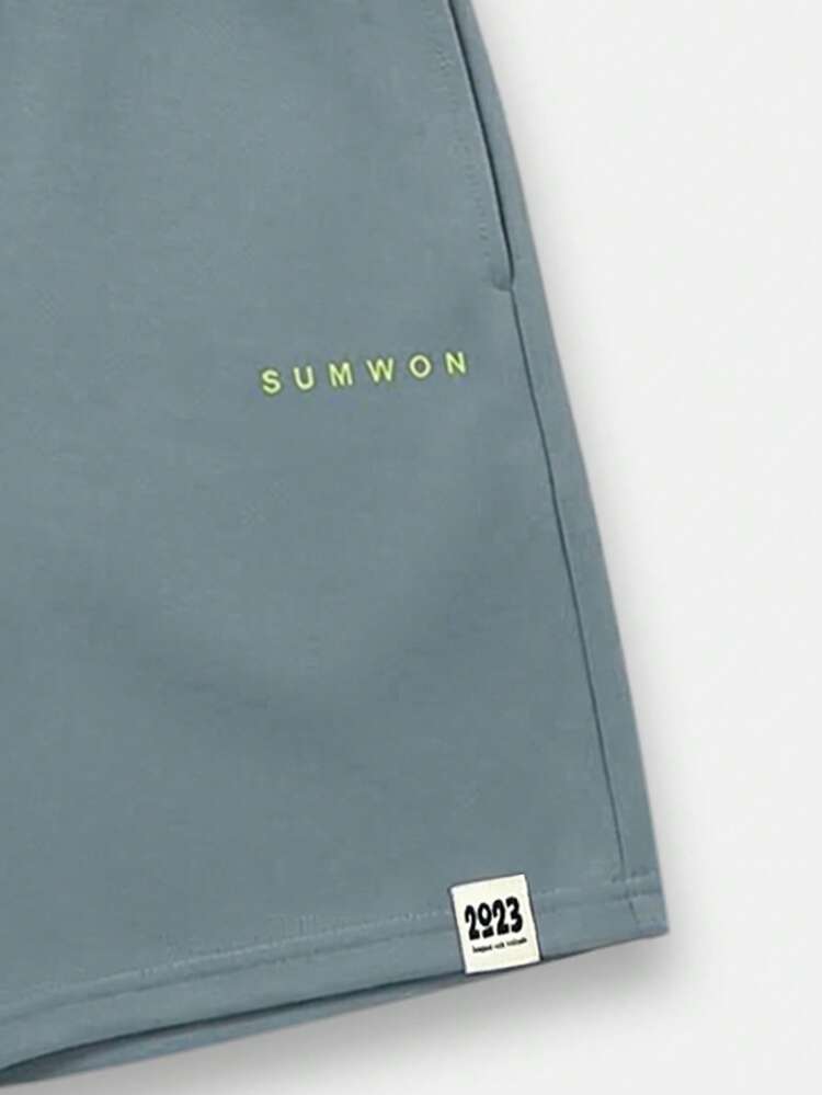 Boys Casual Two Piece Coordinating Set With Chest Text Print Short Sleeve Tee And Matching Elastic Waist Shorts Summer Everyday Wear